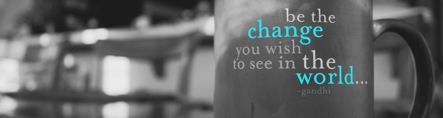 Image of a coffee mug with the text "be the change you wish to see in the world... ~ghandi