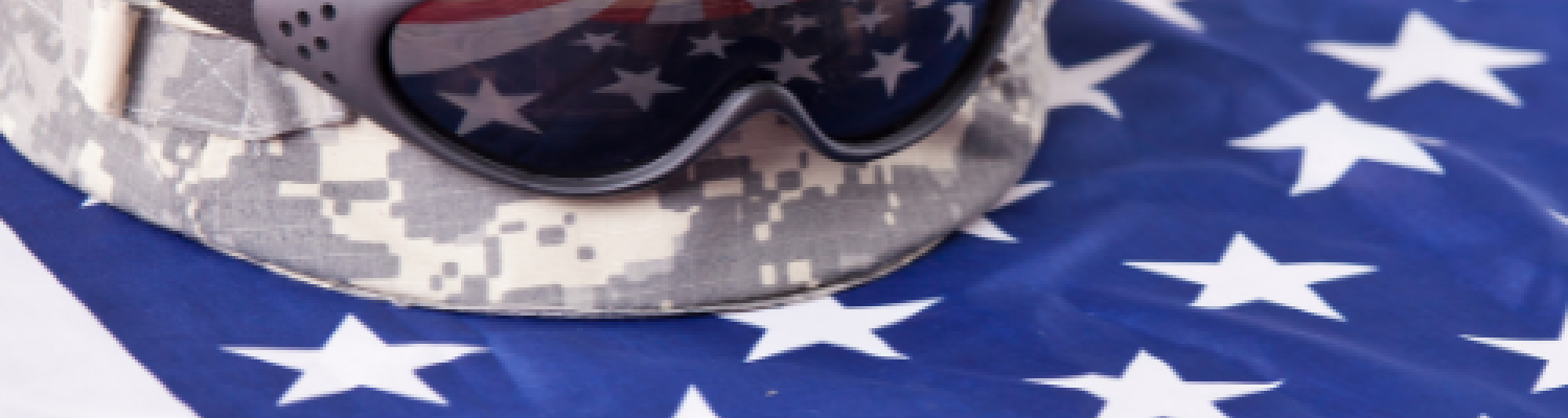 American Flag and soldier's helmet