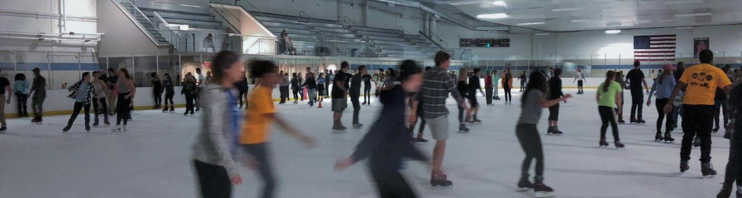 College students skating at the Ice Arena.