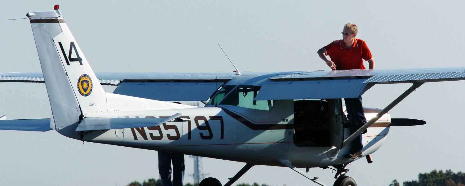A Kent State airplane sits on the runway at the Kent State University airport. Kent State's aeronautics program operates at the Airport with a fleet of 23 single engine and two twin engine aircraft.